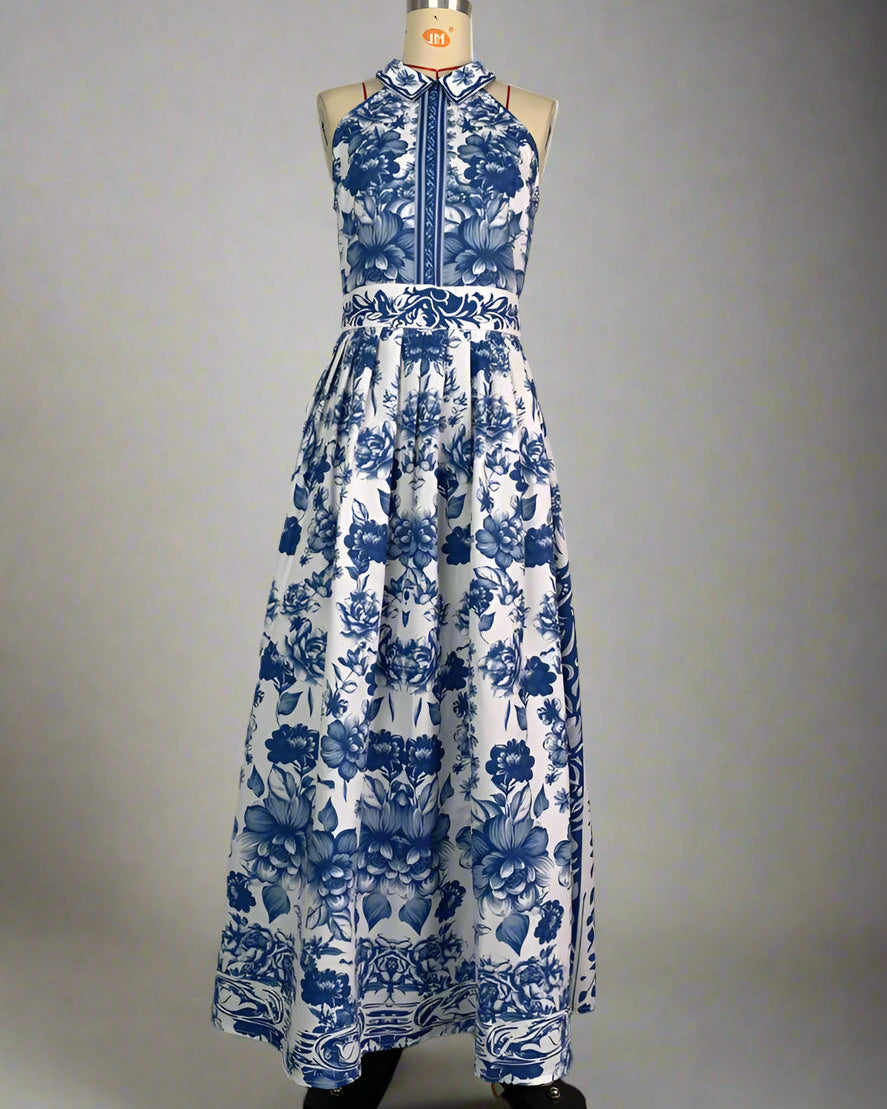 Blue and white floral dress on a mannequin against a neutral background