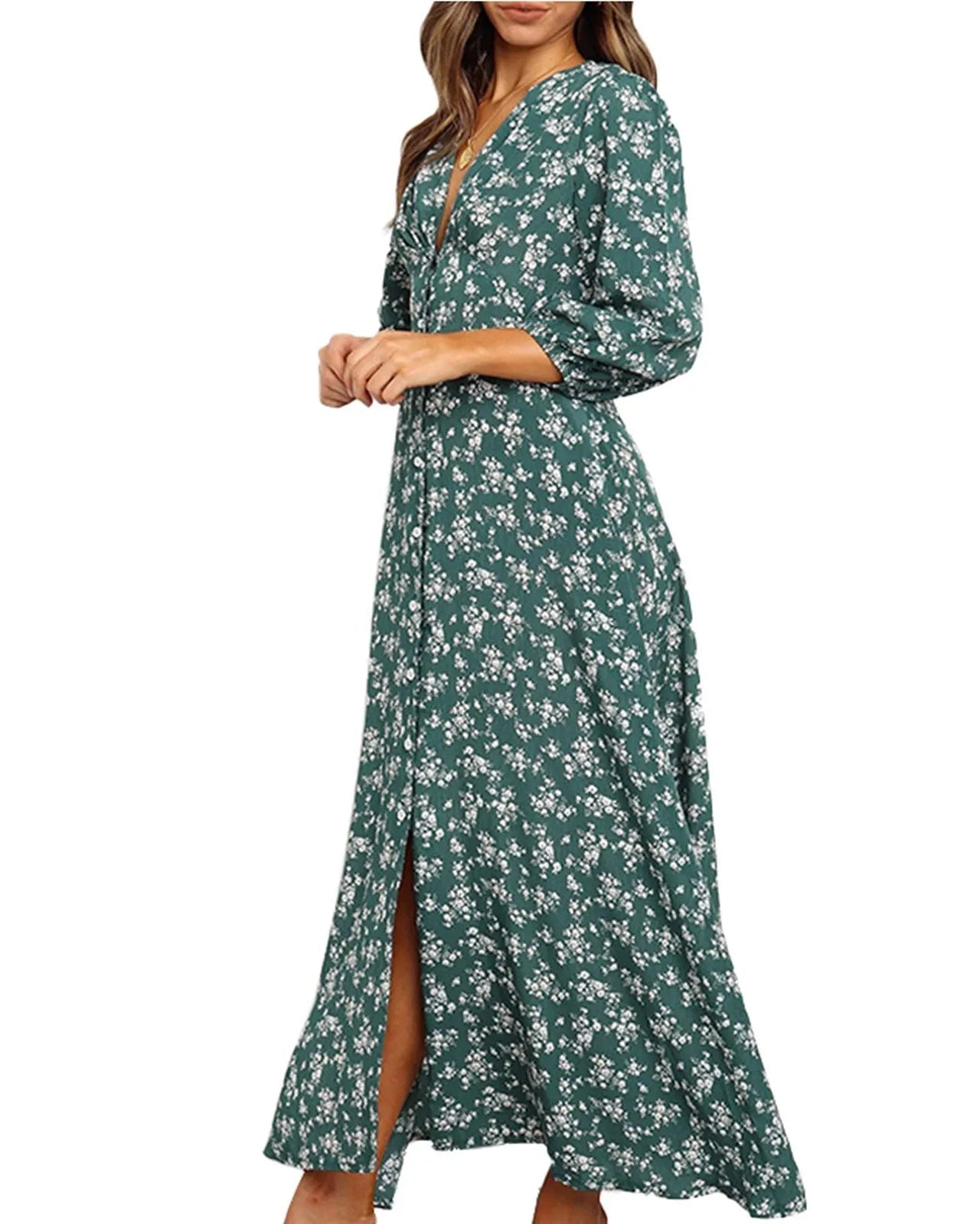 Green floral dress with long sleeves on a white background