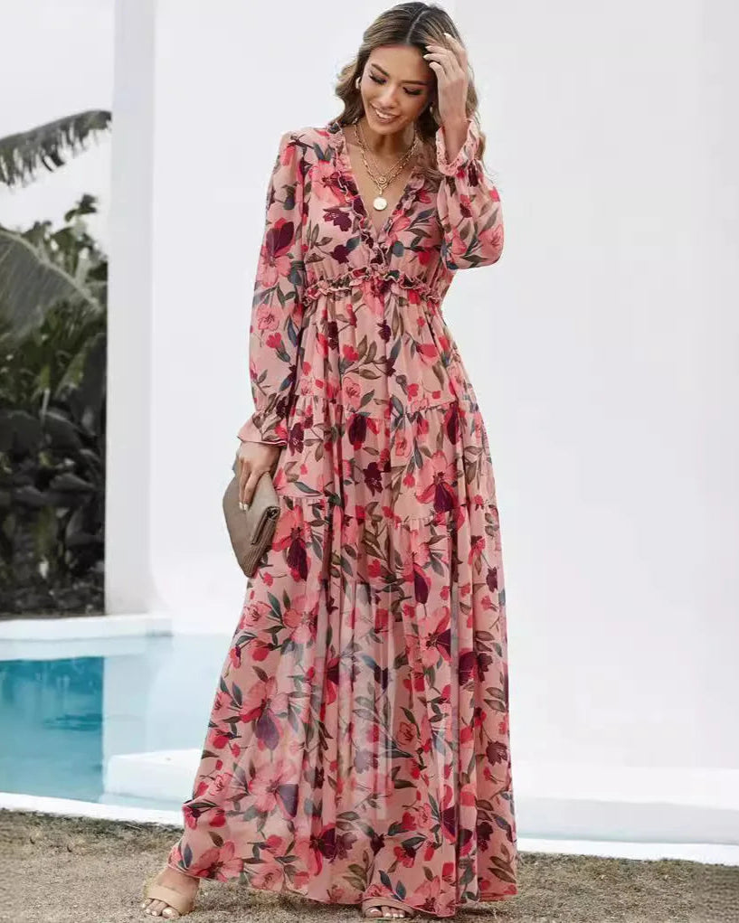 Woman wearing a floral dress by a poolside